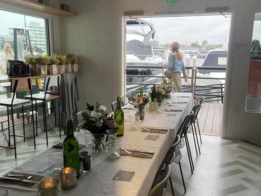 A table on the waterfront set up for a private event.